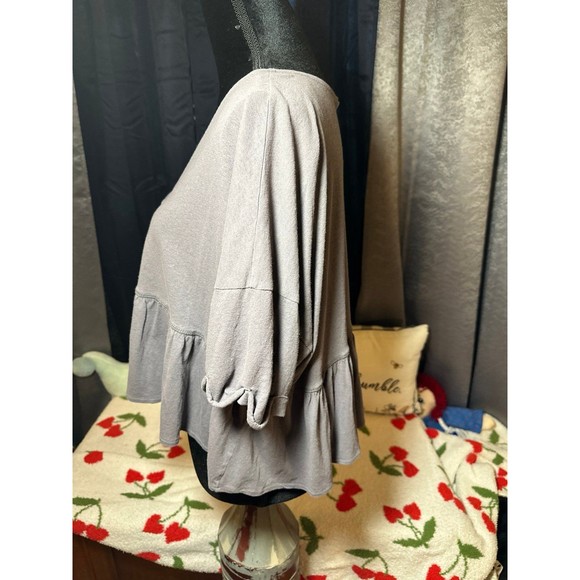 Out from under oversized cropped top - Picture 2 of 5